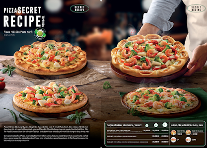 The image displays a promotional advertisement for a pizza recipe from 'Pizza Secret Recipe' featuring two pizzas with shrimp and vegetables as toppin