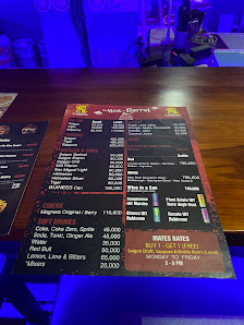 A menu displayed on a table in an indoor setting at Thao Dien, Saigon.