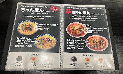 The image displays a two-page menu from a restaurant in Thao Dien, Saigon. It features 'Quan Quan Ramen' with dishes like Champion Ramen, Quail Egg Ch