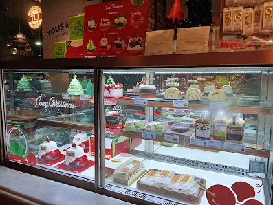 Various Christmas-themed cakes and desserts