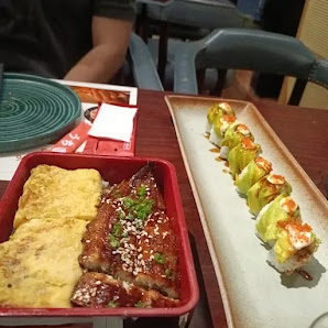 Sushi Rolls and Grilled Fish Platter