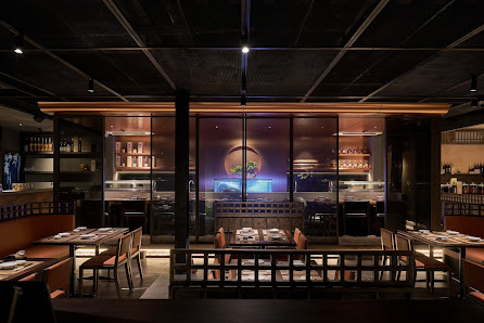 The image depicts an upscale interior of a restaurant in Thao Dien, Saigon with modern and sophisticated design elements.